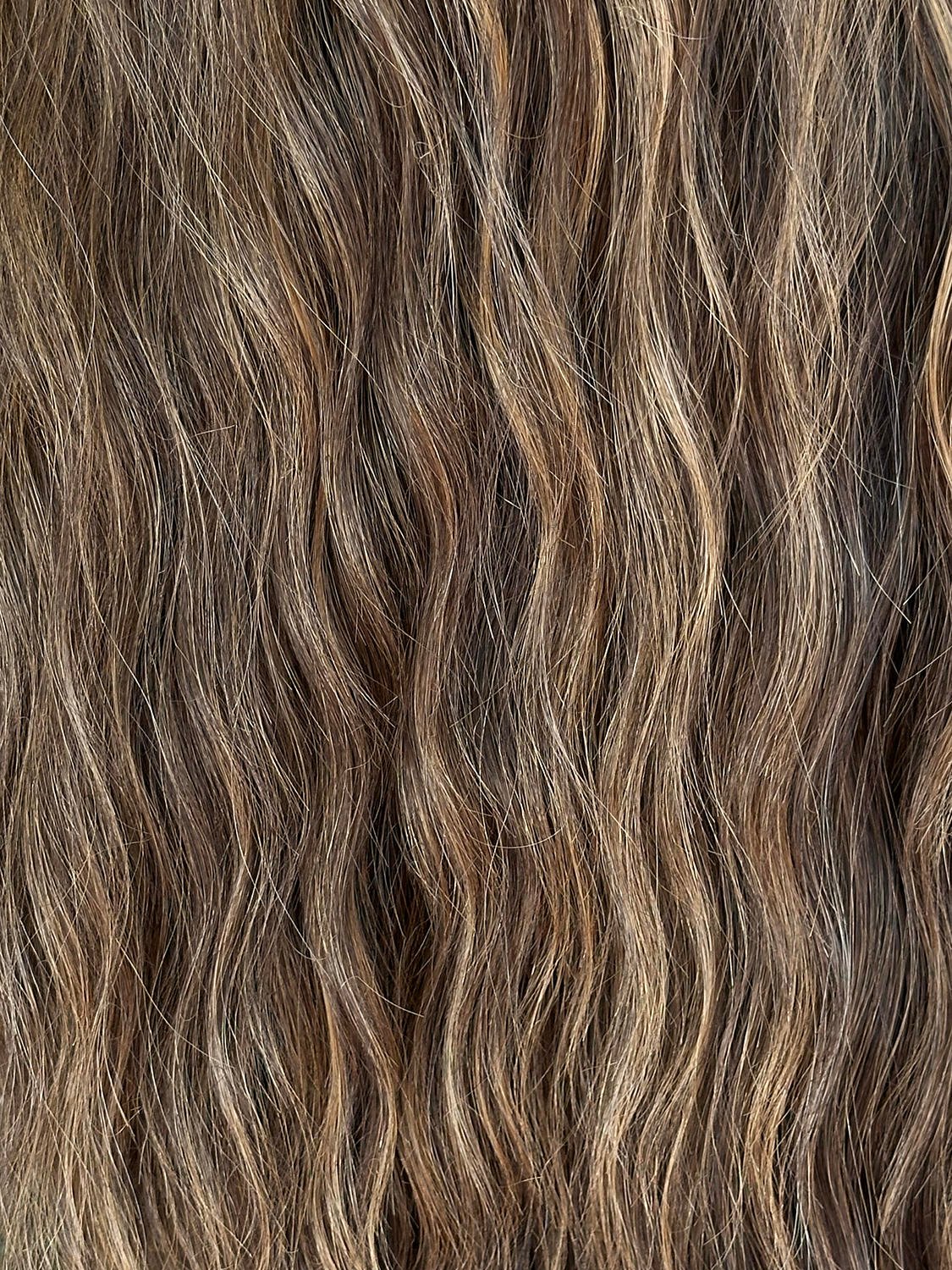 closeup of the waterwave synthetic fibres of the Denise wig
