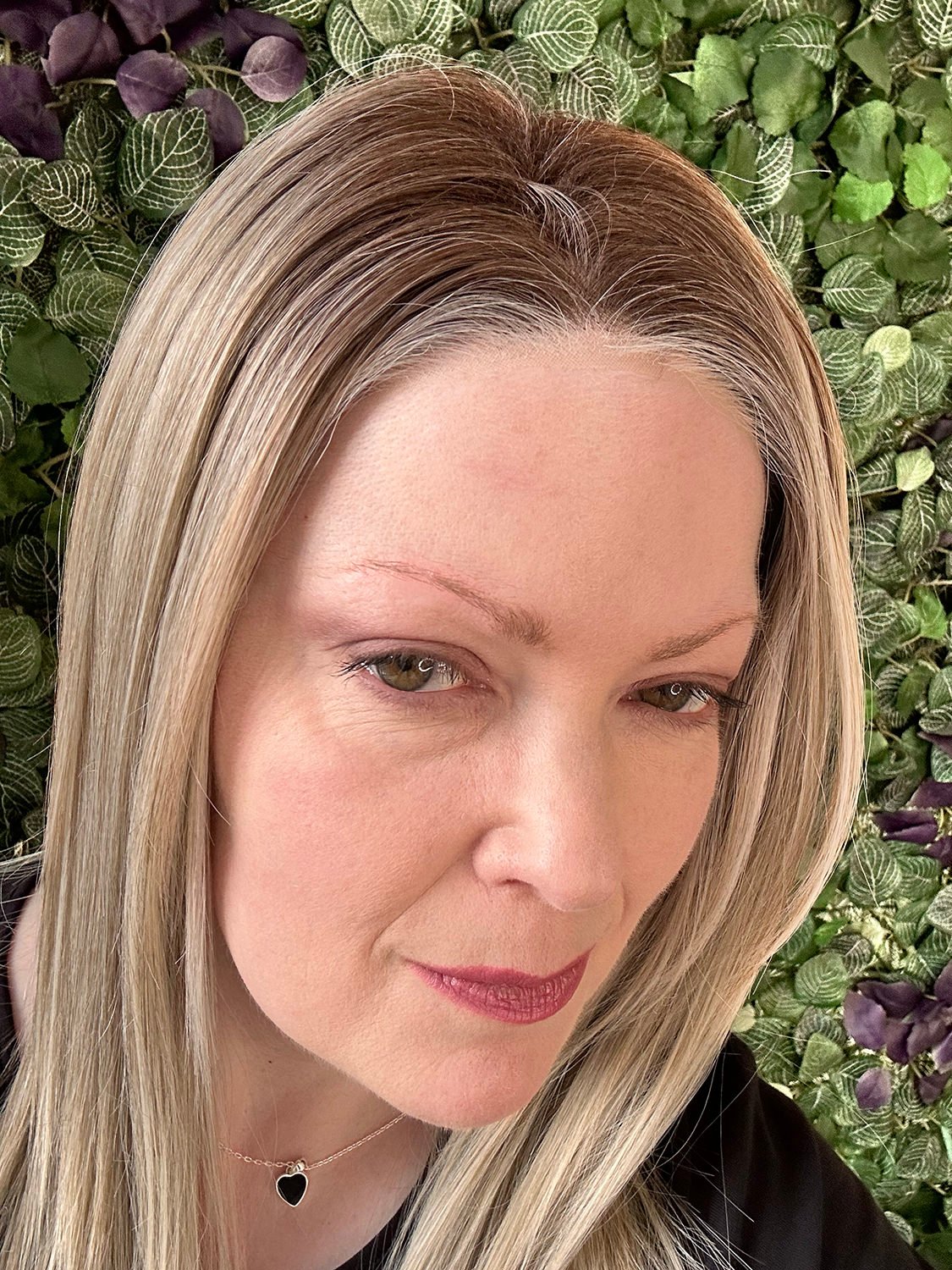 closeup of the hairline of Kai's wig in Bali blonde