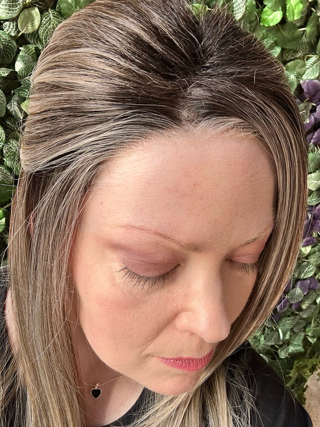 a closeup of the hairline on Kai's wig in Milan blonde